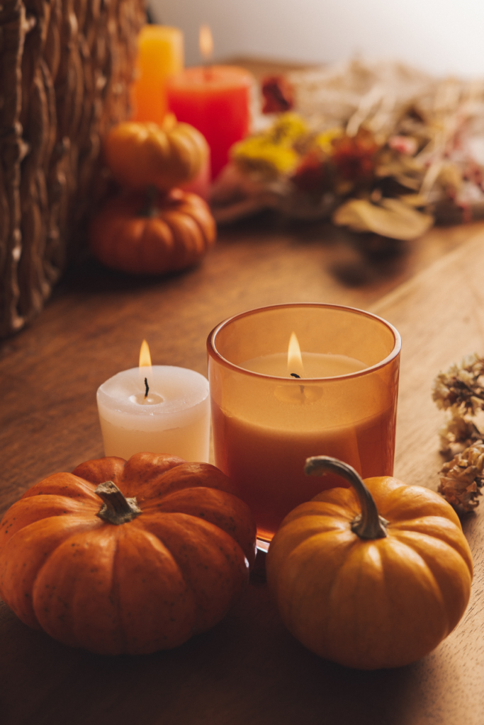 orange Pumpkins with candles as a Thanksgiving Centerpiece Ideas